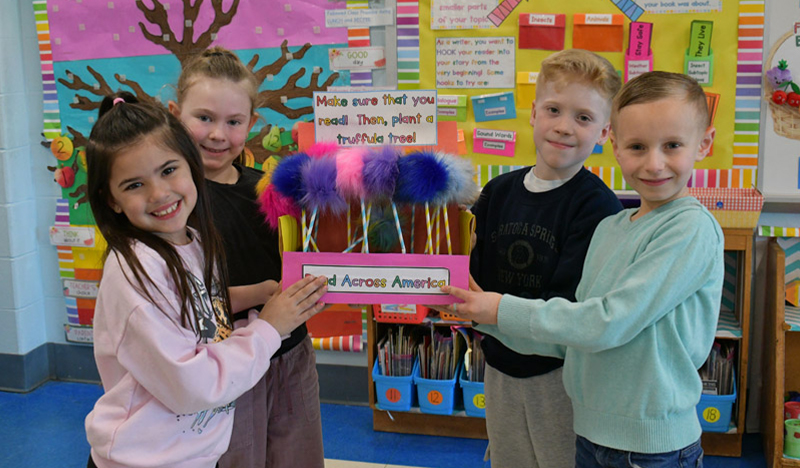 Students holding their project